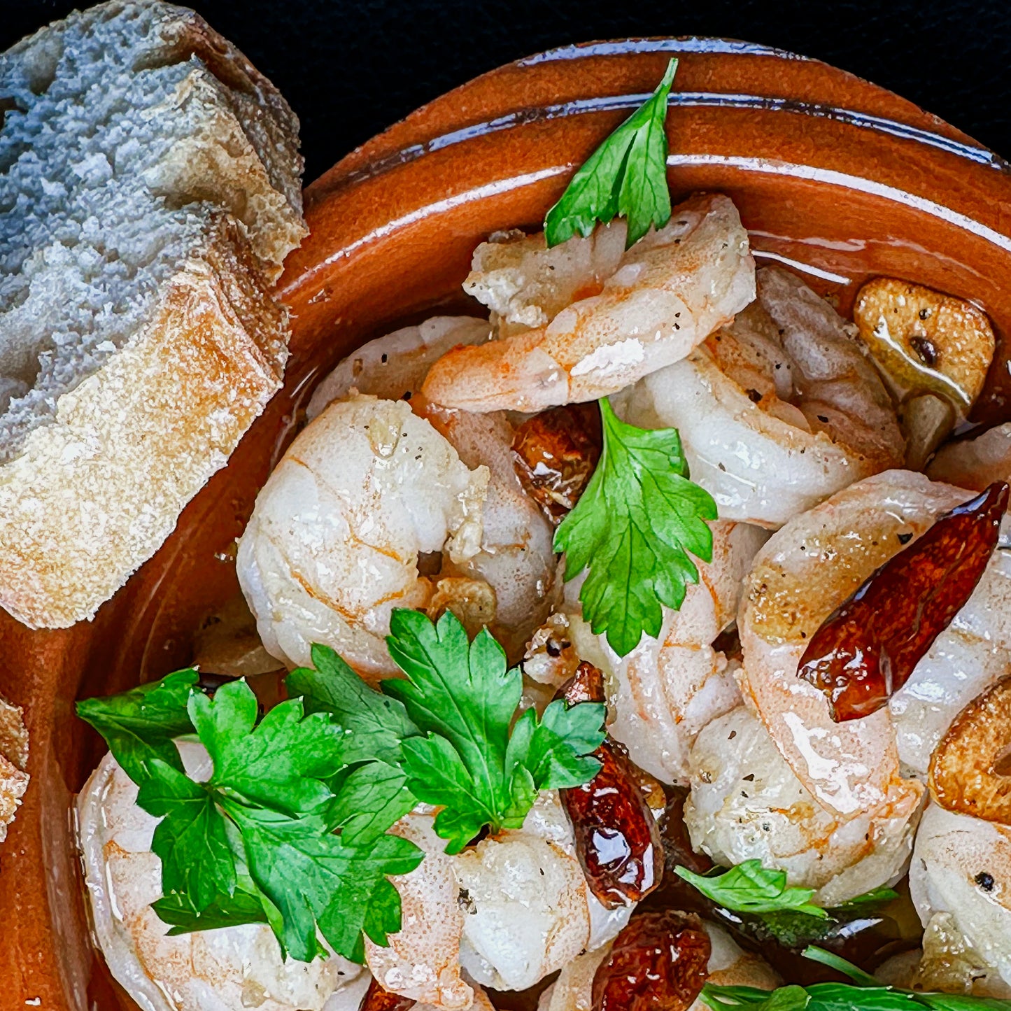 Gambas al ajillo met Oro de Genave biologische extra vierge olijfolie van casagomez.nl